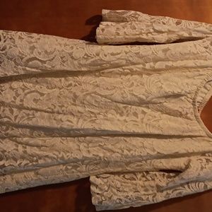 Ivory colored lace shirt. Can also be worn as a mini dress. On or off shoulder.